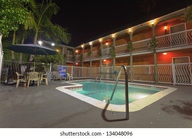 Pool Of A Motel At Night. USA. California.