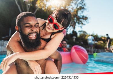 Pool party, love and couple piggyback, having fun or bonding. Swimming, romance diversity and happy black man carrying woman in water and laughing at comic joke or meme at summer event or celebration - Powered by Shutterstock