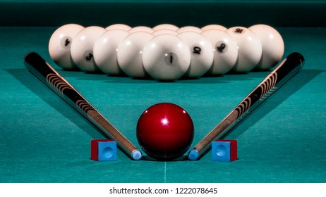 pool table with balls and cue