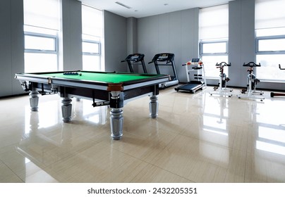 The pool table is indoors
