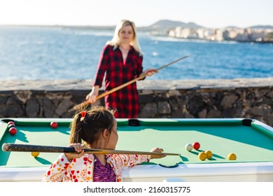 Pool Table Near The Sea, Family Plays Billiards