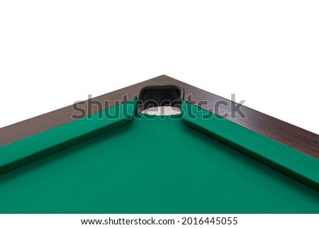 A pool table. Parts of a billiard table close-up. American pool table. Billiard pockets. Wooden billiard table. 