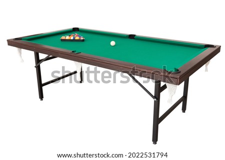 A pool table. Parts of a billiard table close-up. American pool table. Billiard pockets. Wooden billiard table. 