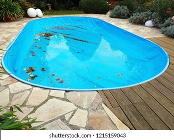 Pool With Tarpaulin In Winter Cover