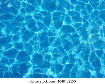 Pool water pattern background. Abstract backgrounds and texture. Summer holiday vacation concept.