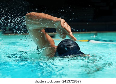 Pool, water splash and athlete swimming in sport for competition, race or training in cardio. Fitness, workout and person exercise for health, wellness or practice stroke or performance in gym - Powered by Shutterstock