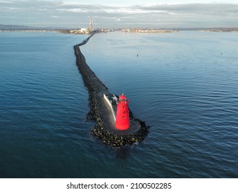 Poolbeg Lighthouse Is An Active Aid To Navigation At The Mouth Of The River Liffey, Near Poolbeg, Dublin. First Established In 1767, It Initially Operated On Candlepower But This Was Changed To Oil In