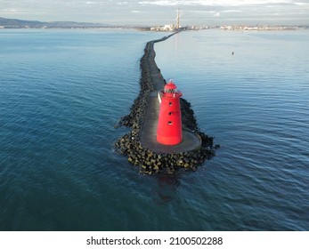 Poolbeg Lighthouse Is An Active Aid To Navigation At The Mouth Of The River Liffey, Near Poolbeg, Dublin. First Established In 1767, It Initially Operated On Candlepower But This Was Changed To Oil In