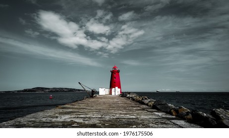 Poolbeg Lighthouse, Dublin, Ireland Is An Active Aid To Navigation At The Mouth Of The River Liffey, Near Poolbeg, Dublin. First Established In 1767, It Initially Operated On Candlepower But This Was