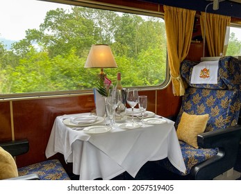 Poole, Dorset, England - July 2021: Formal Table Setting For Dinner In A Luxury Train Operated By Statesman Rail, A Charter Rail Company.