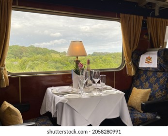 Poole, Dorset, England - July 2021: Formal Table Setting For Dinner In A Luxury Train Operated By Statesman Rail, A Charter Rail Company.