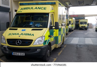 Poole, Dorset/UK - 02/15/2015: Line Of Ambulances Waiting Outside Accident And Emergency Department Of NHS Hospital