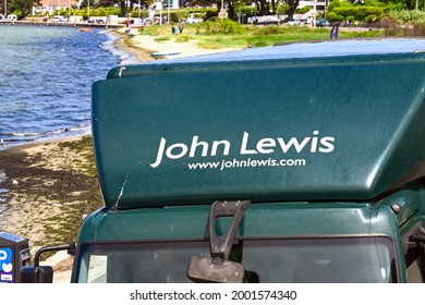 Poole, England - June 2021: John Lewis Partnership Lorry Delivering Goods On The Seafront In Poole. 