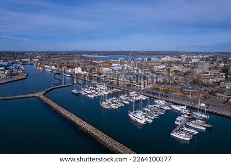 Poole Harbour is a large natural harbour in Dorset, southern England, with the town of Poole on its shores. 