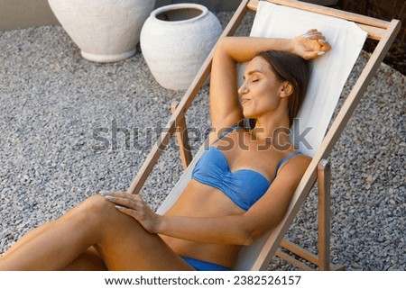 Poolside Elegance with Young Woman
