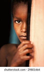 Poor African Child In The Door, Village Near Kalahari Desert, Botswana