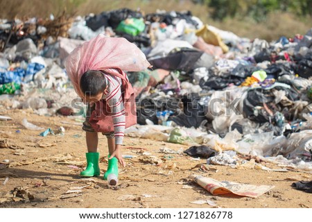 Poor children collect garbage for sale because of poverty, Junk recycle, Child labor, Poverty concept, World Environment Day,