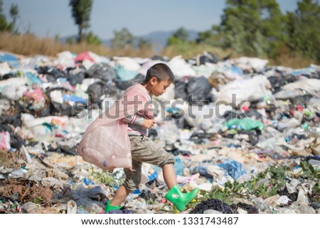 Poor children collect garbage for sale because of poverty, Junk recycle, Child labor, Poverty concept, human trafficking, World Environment Day,