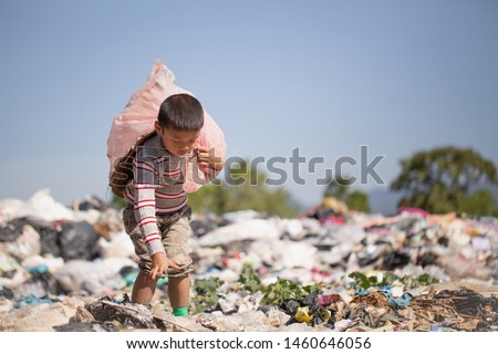 Poor children collect garbage for sale because of poverty, Junk recycle, Child labor, Poverty concept, World Environment Day,