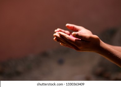 Poor children praying with two hands to god - Shutterstock ID 1330363409