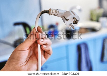 Poor contact between socket and plug led to power cord burning and almost caused fire.