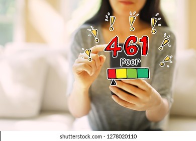 Poor Credit Score Theme With Woman Using Her Smartphone In A Living Room