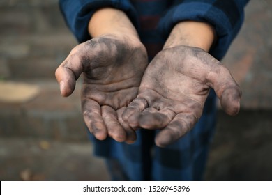 Poor Homeless Child Begging For Help Outdoors, Closeup