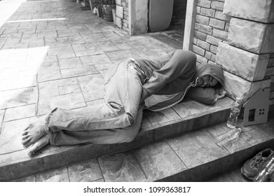 Poor Homeless Man Sleeping On Stair Stock Photo 1099363817 | Shutterstock