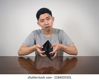 Poor Man Strain With No Money Show Empty Wallet At Table