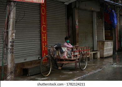 A Poor Man Stuck At His Van After Heavy Rain At North Kolkata After The State Imposed Two Days Of Lockdown In A Week To Fight Against The   COVID-19  In Kolkata On July 23, 2020.