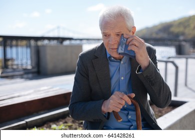 Poor Old Man Crying Outdoors