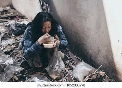 Poor People,homeless Or Beggar Begging For Help Sitting At Dirty Slum.concept For Poverty Hunger,human Rights,donate And Charity For Underprivileged Children In Third World