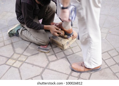 Poor Shoe Shiner