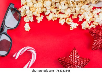 Pop Corn And 3d Glasses, Holiday Decorations In Red Background. Christmas Concept