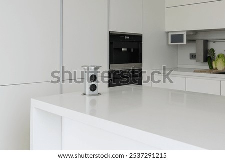 Pop up electrical socket on kitchen worktop.