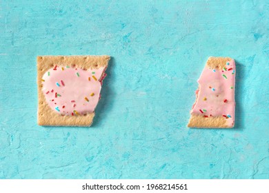 Pop Tart, Broken, Overhead Flat Lay Shot On A Blue Background