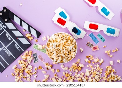 Popcorn, 3d Glasses And Movie Tickets Top View Flat Lay On Purple Solid Background