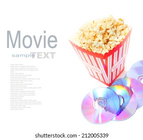 popcorn in box with DVD disk on white background 