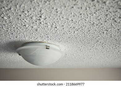 Popcorn Ceiling with lighting fixture - Shutterstock ID 2118669977