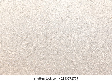 Popcorn ceiling texture in white
