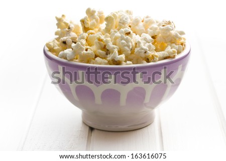 Similar – Striped box with popcorn on yellow background.