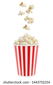 Popcorn falling into a red striped paper cup, isolated on white background - Shutterstock ID 1443732254
