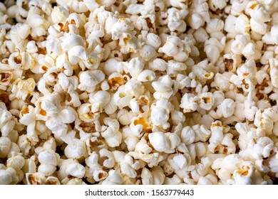 A popcorn on a wooden table