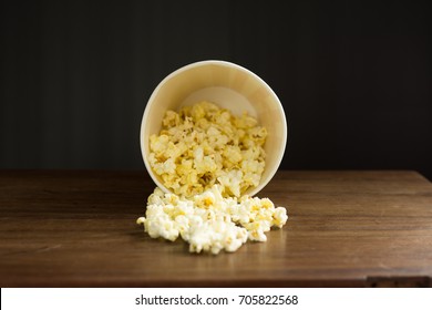 Popcorn on wooden table.  - Powered by Shutterstock