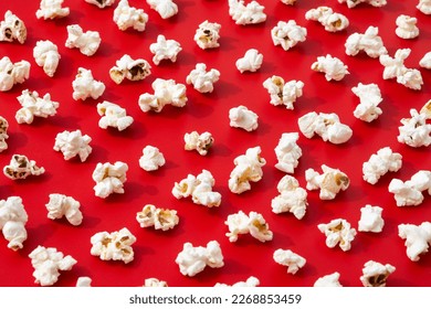 Popcorn pattern on red background. Top view