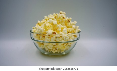 Popcorn Photo Taken From Different Angles, In A Cup And In A Cute Popcorn Cup. Suitable For Use As A Background Or A Product Introduction Image With Popcorn At A Party.