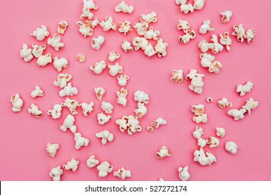 Popcorn  in pink background
.top view
