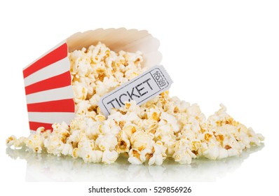 Popcorn Spilled From A Square Box And Gray Movie Ticket Isolated On White Background