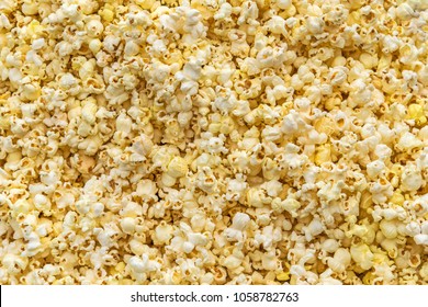Popcorn texture background. Yellow sweet popcorn. Pattern
