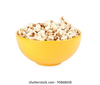 Popcorn In A Yellow Bowl Isolated On White